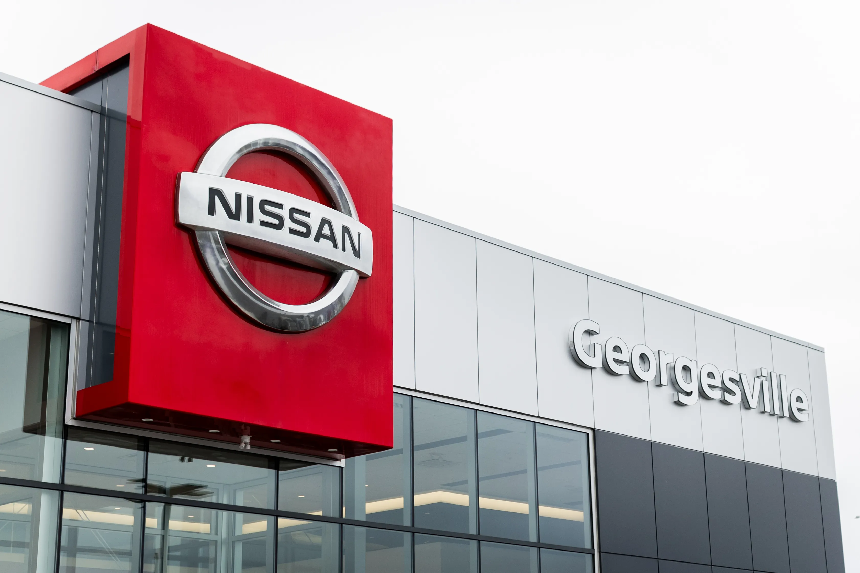 The Georgesville Nissan facade — the red Nissan tower badge beside the Georgesville sign